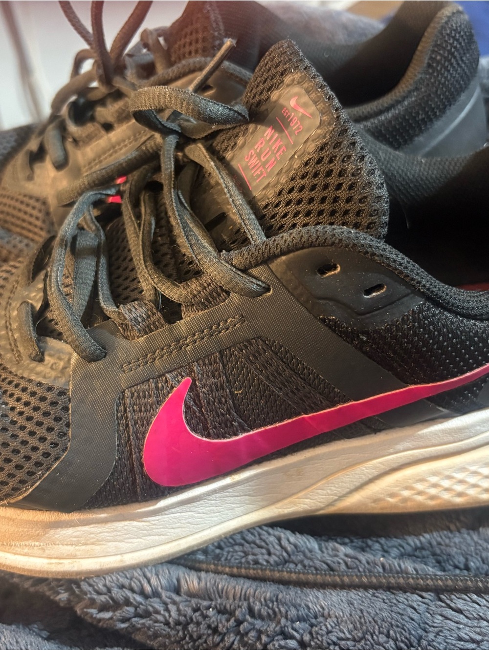 Nike Women’s Black Athletic Shoes with Pink Swoosh